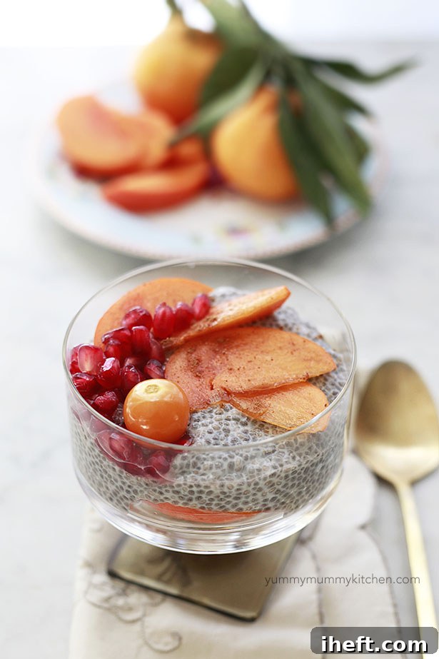 This basic chia pudding recipe is topped with persimmon and pomegranate seeds for an easy breakfast.
