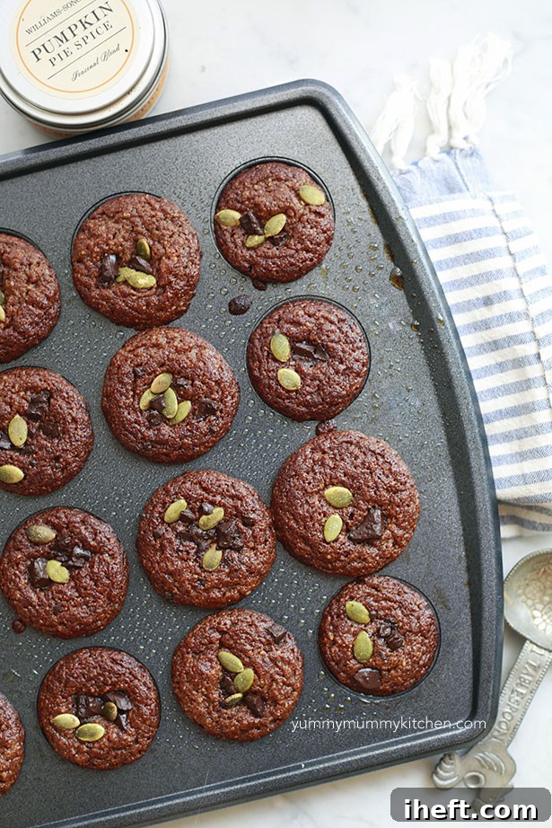 Close-up of a batch of fresh paleo pumpkin muffins