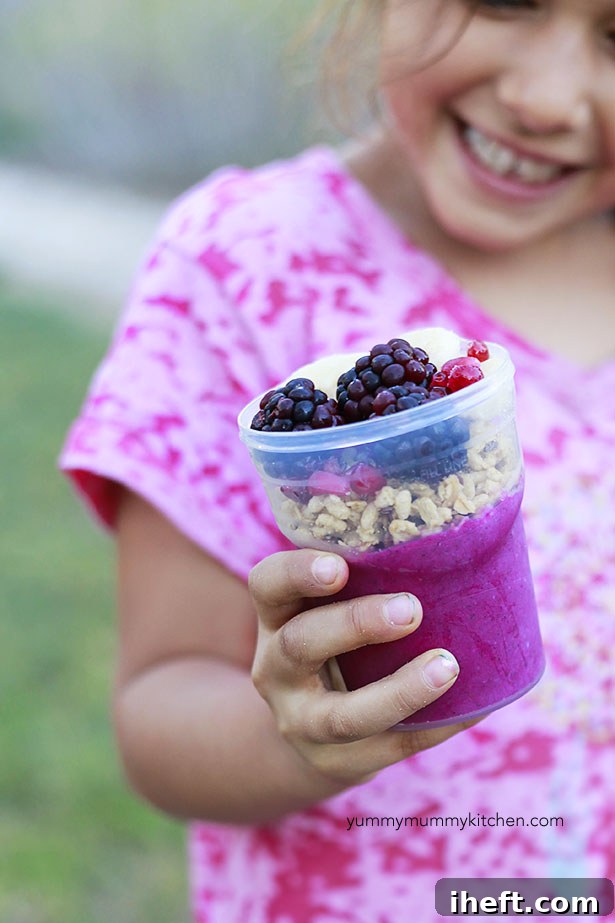 How to freeze and pack acai bowls and smoothies for school or work, showcasing a neatly packed acai bowl.
