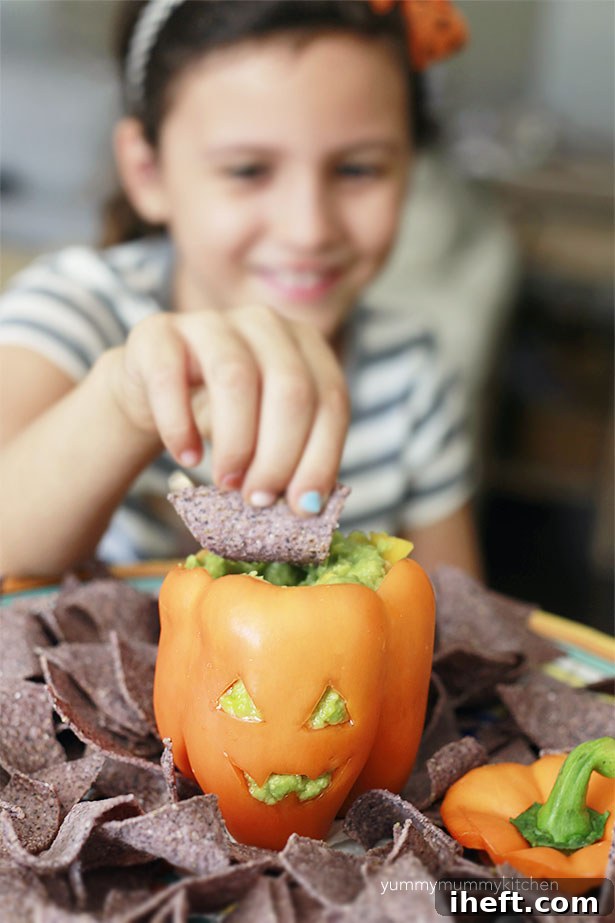 Homemade Mango Guacamole in a Jack-o'-Lantern Bell Pepper