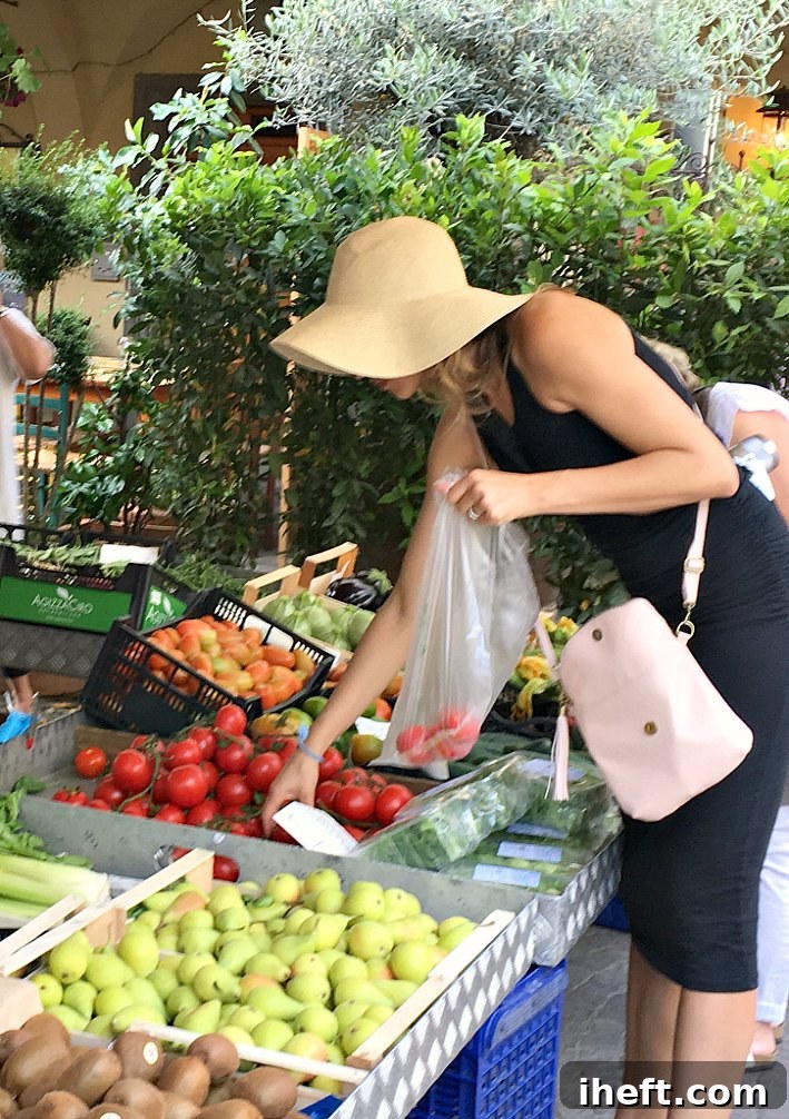 Shopping for produce at the farmers market in Greve in Chianti, Italy. 