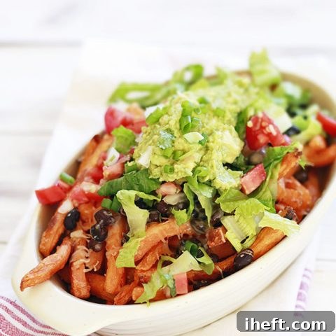 Delicious Loaded Sweet Potato Fries with Guacamole and Black Beans