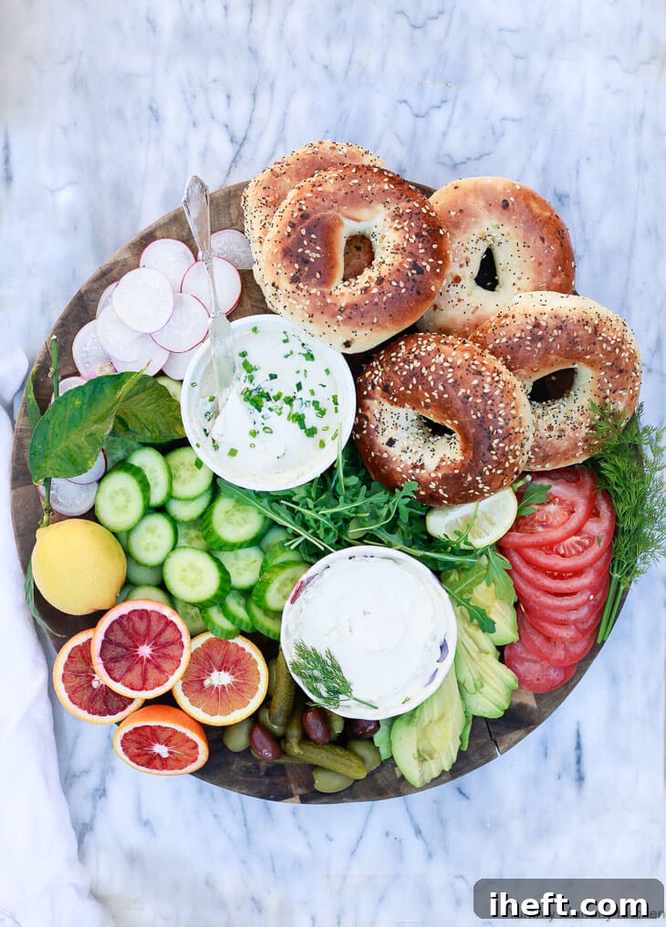 A beautiful bagel and vegan cream cheese board with fresh toppings