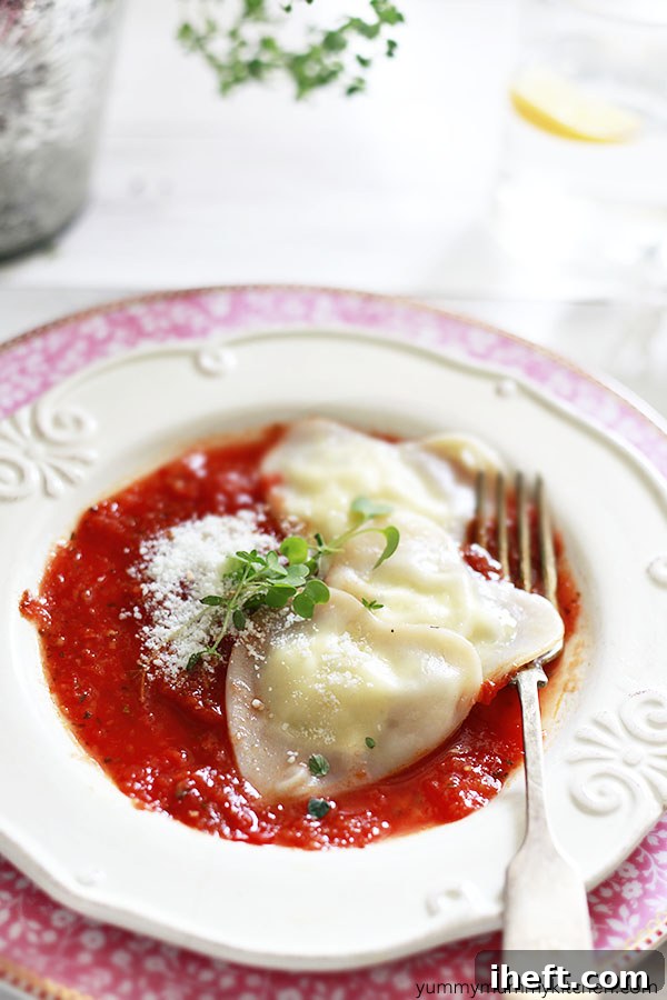 Heart-shaped homemade cheese ravioli made with wonton wrappers