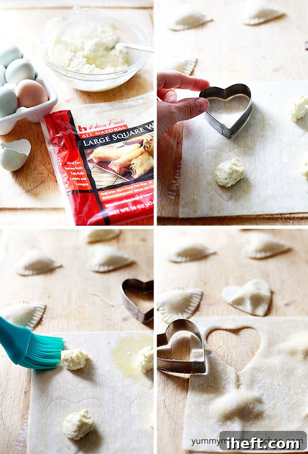 Two hands pressing heart-shaped wonton ravioli together on a wooden surface.