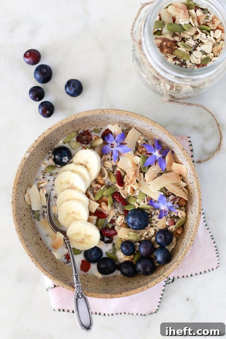 This easy superfood Bircher Muesli recipe makes a wonderfully healthy vegan breakfast. It can be prepared by soaking overnight or enjoyed hot or cold, packed with nutritious ingredients like chia, hemp, and pumpkin seeds.