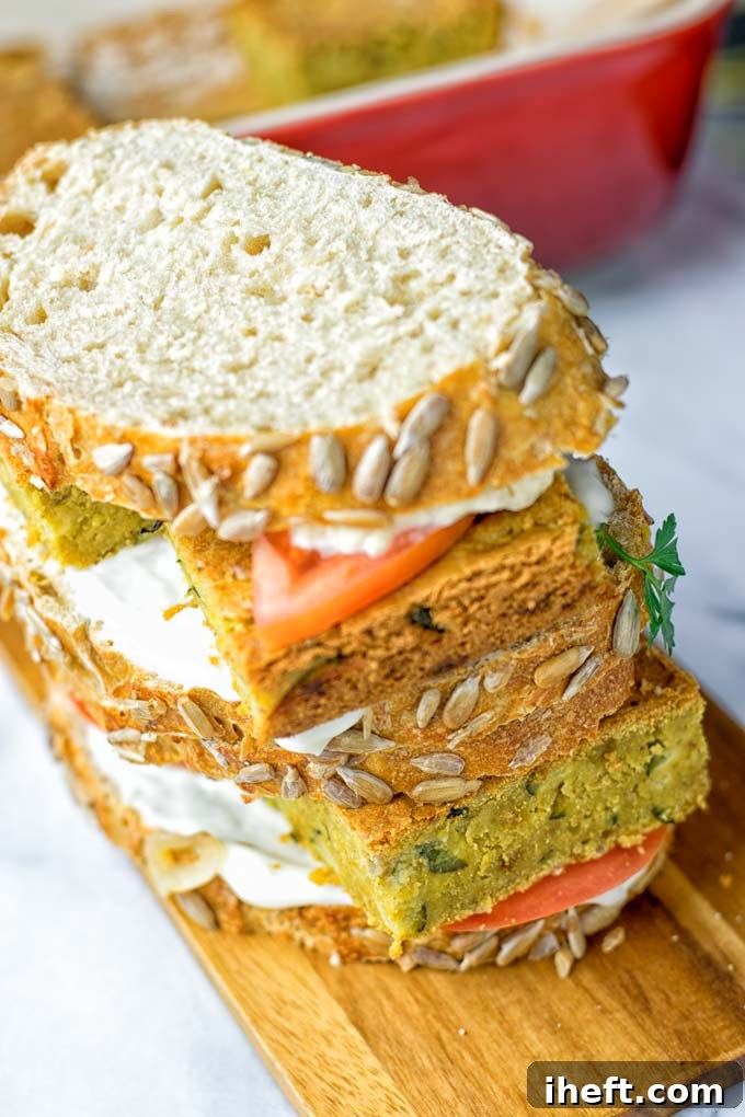 A savory chickpea frittata breakfast sandwich with fresh herbs.