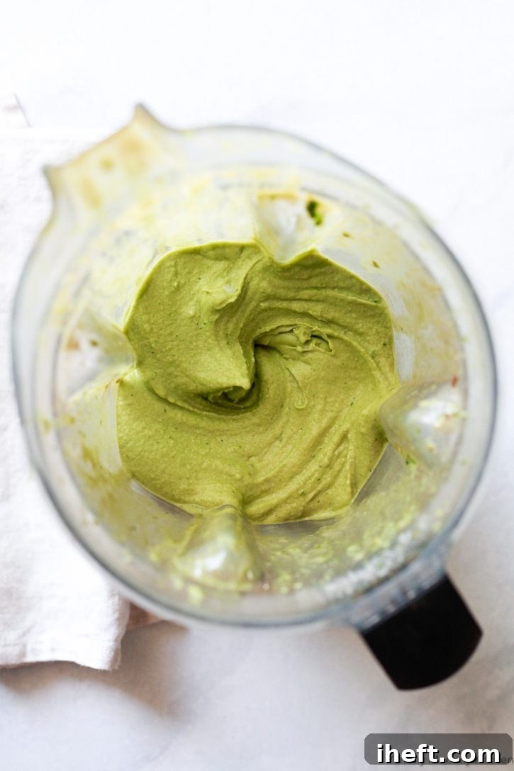 Thick and creamy matcha green tea smoothie in a Vitamix blender.
