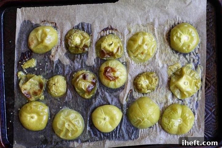 Juicy roasted tomatillo halves out of the oven and ready to make into tomatillo salsa. 