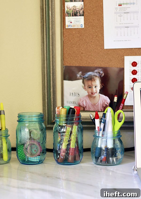 Collection of blue and clear mason jars, some with flowers, others for storage, showcasing versatility.