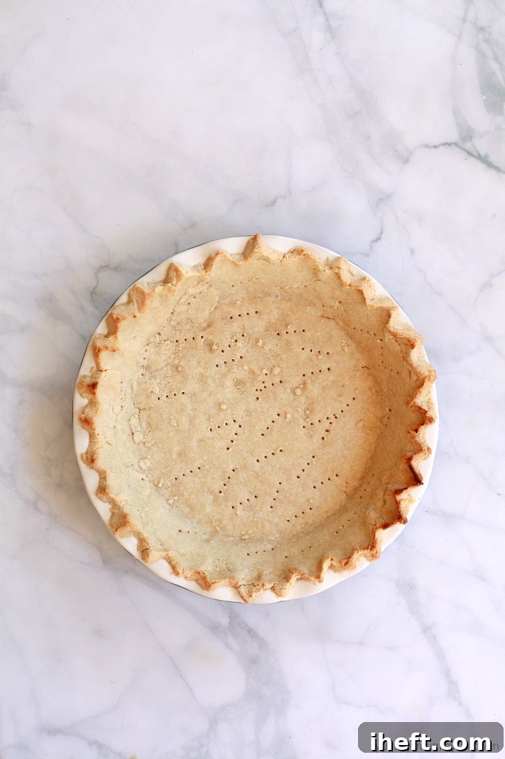 The perfect gluten-free, vegan, paleo pie crust made with almond flour. This healthy pie crust is easy to make.