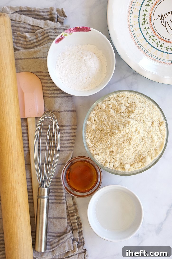 This gluten-free vegan pie crust is made with almond flour, maple syrup, arrowroot, and coconut oil.