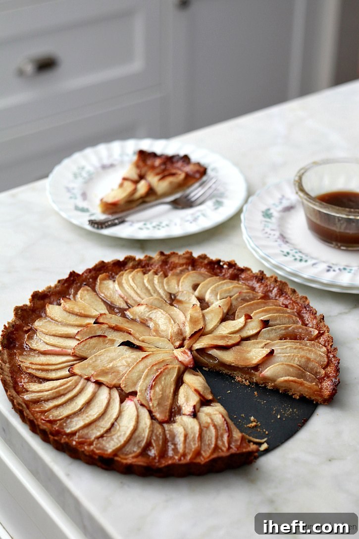 This beautiful vegan apple tart has a gluten free almond flour crust.