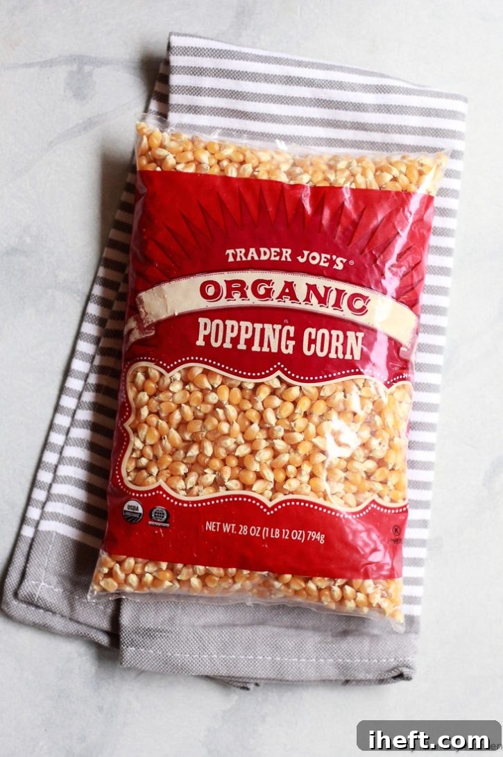 A bag of organic popping corn from Trader Joe's sits on a countertop, ready to be transformed into delicious stovetop popcorn.