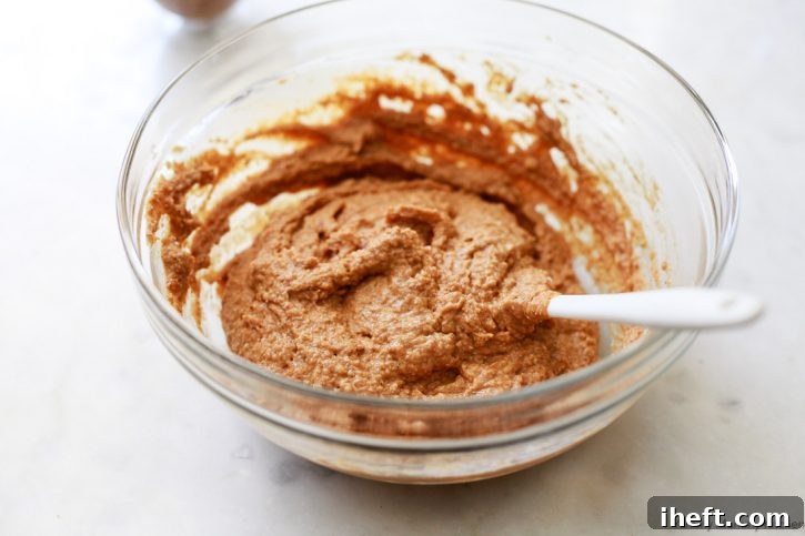 Vegan gluten free pumpkin muffin batter ready for the muffin pan. 