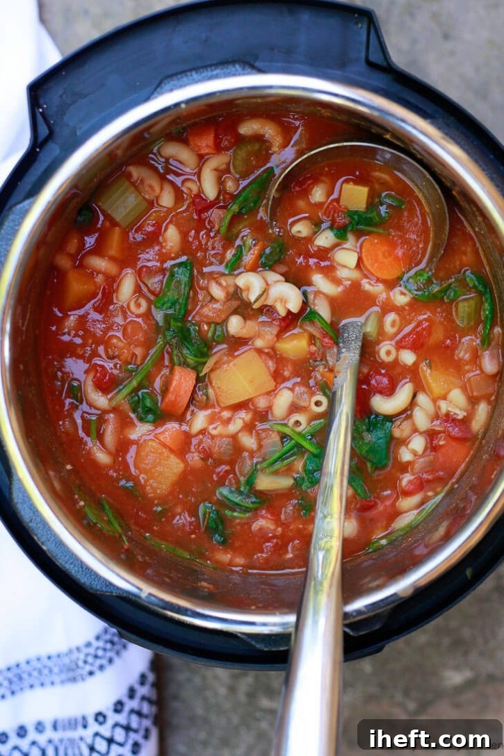 A glorious pot of easy minestrone soup, cooked to perfection in the Instant Pot, brimming with butternut squash, carrots, celery, spinach, tomatoes, pasta, and tender white beans. This Instant Pot minestrone is a truly wonderful vegetarian dinner recipe, packed with wholesome goodness.