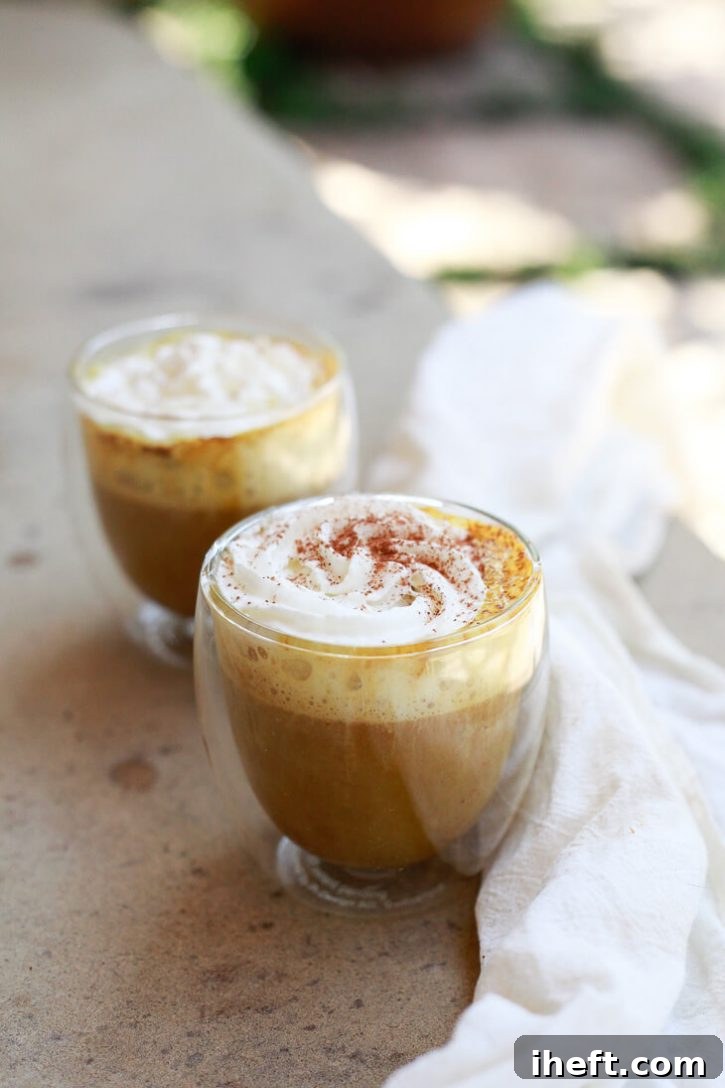 Homemade pumpkin spice lattes in clear insulated glass coffee tumblers. This delicious vegan pumpkin spice latte recipe is so easy and healthy. 