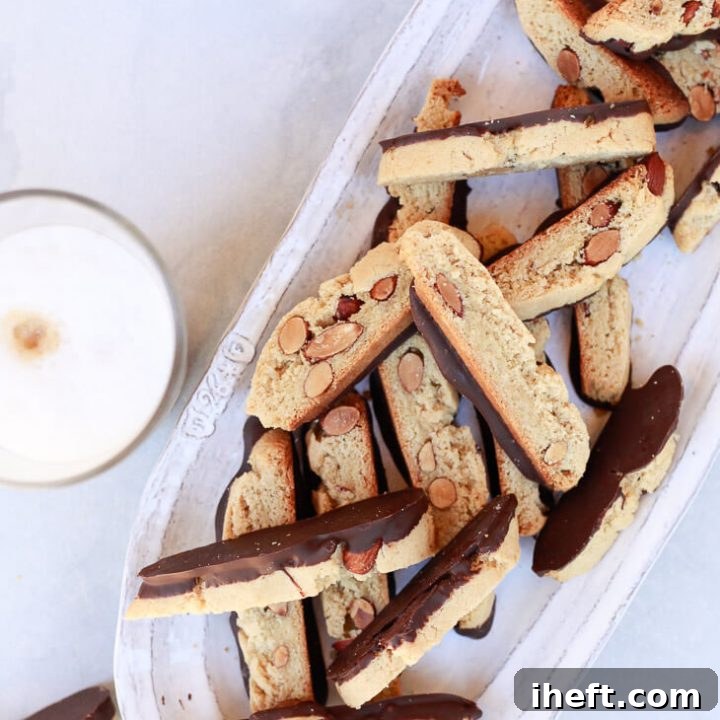 A stunning plate of gluten-free almond biscotti, showcasing their golden-brown color and delicate crunch.