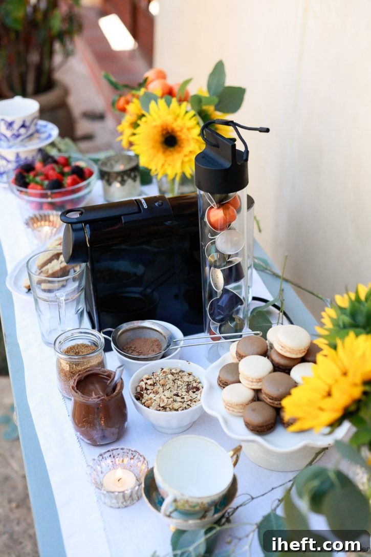 A beautifully arranged DIY coffee and dessert bar with flowers and treats.