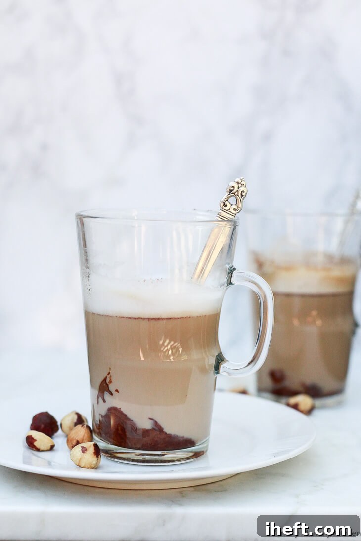 Homemade chocolate hazelnut latte made with almond milk and a rich chocolate hazelnut spread.