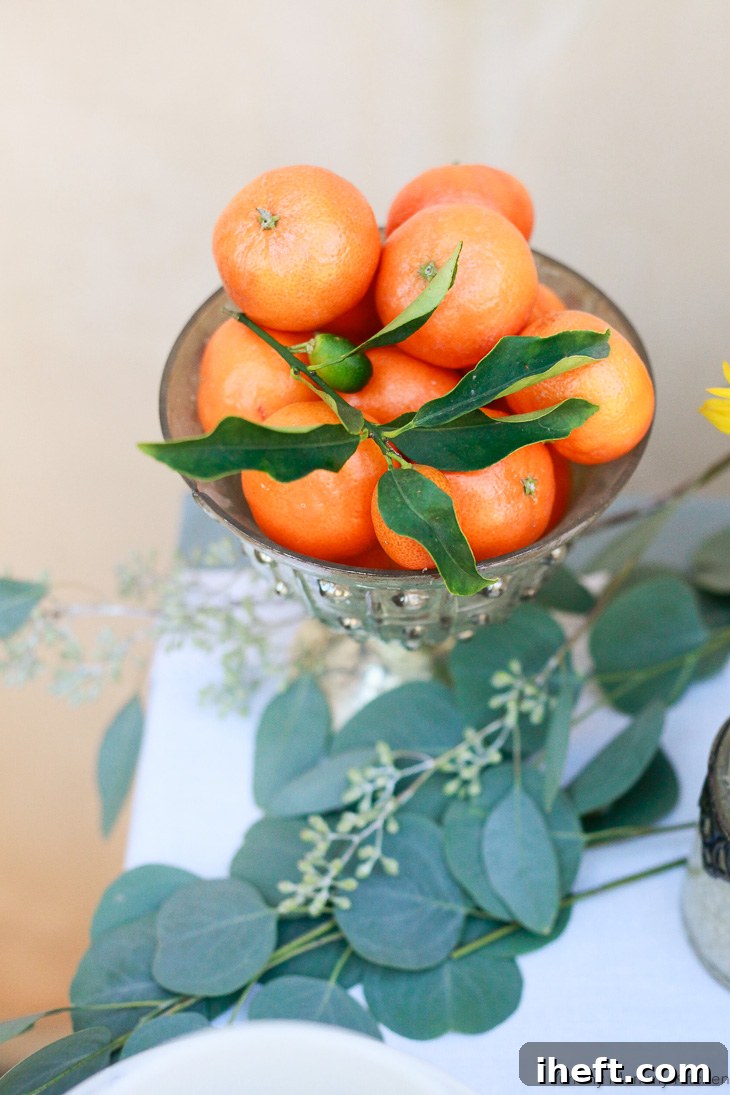A refreshing bowl of fresh tangerines and berries adds color and healthy options to the coffee bar spread.