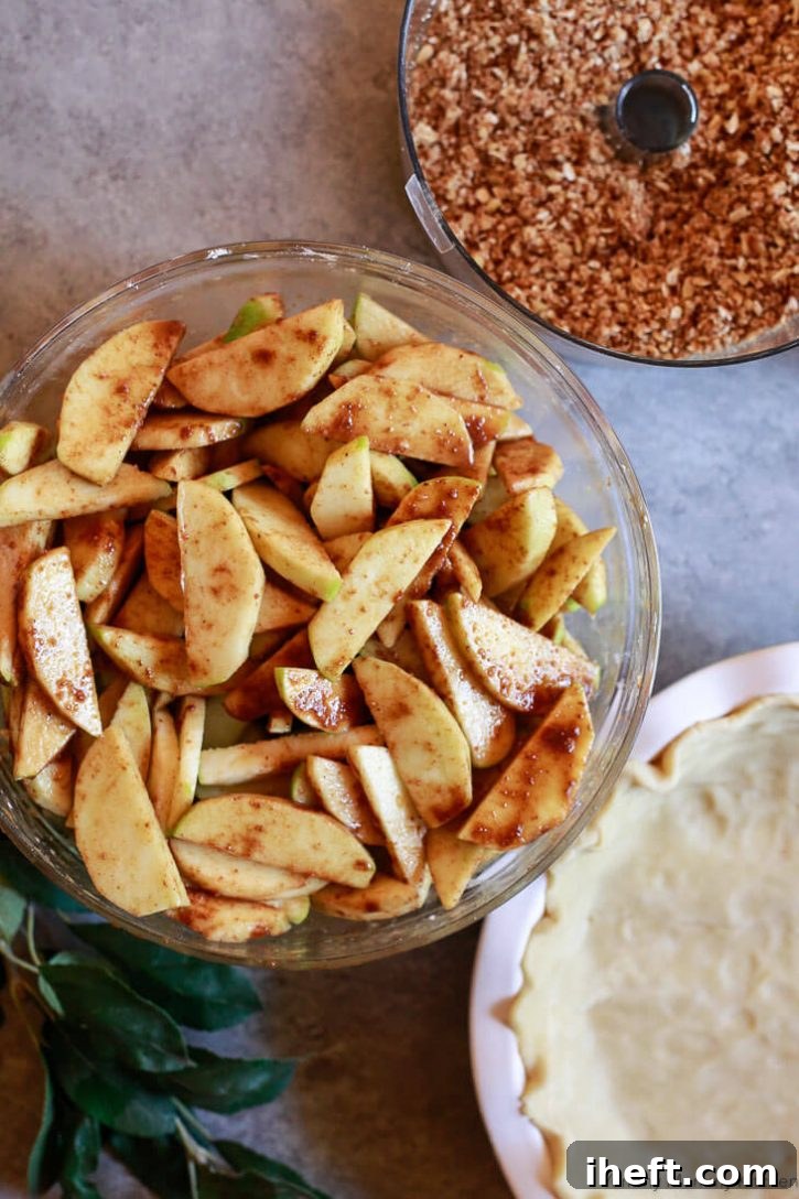 The layers for apple crumble pie are apple filling, pie crust, and oatmeal crumble topping. 