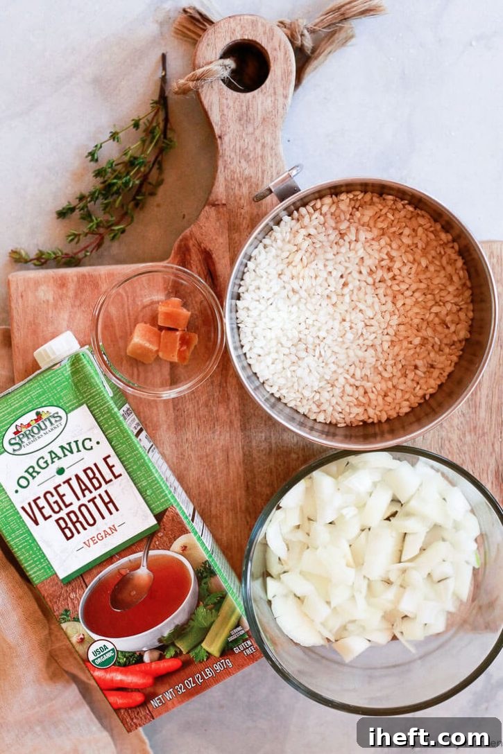 Instant Pot risotto ingredients include arborio rice, chopped yellow onion, garlic, and vegetable broth. 