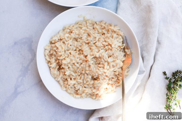 A bowl of plain creamy risotto in a bowl. 