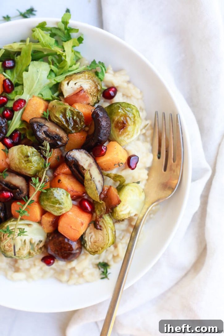A beautiful bowl of simple Instant Pot risotto topped with roasted vegetables: mushrooms, butternut squash, and Brussels sprouts. Easy Instant Pot vegetable risotto is a delicious vegetarian, vegan, gluten free dinner. 