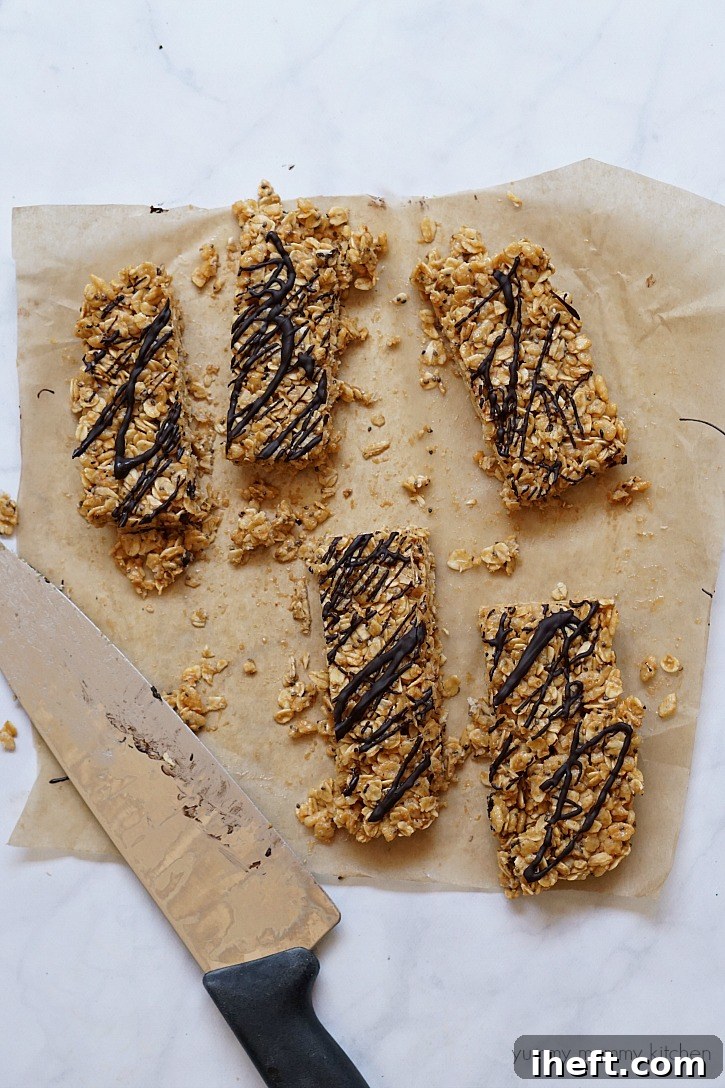These wholesome no-bake peanut butter granola bars are drizzled with a touch of dark chocolate for extra indulgence.