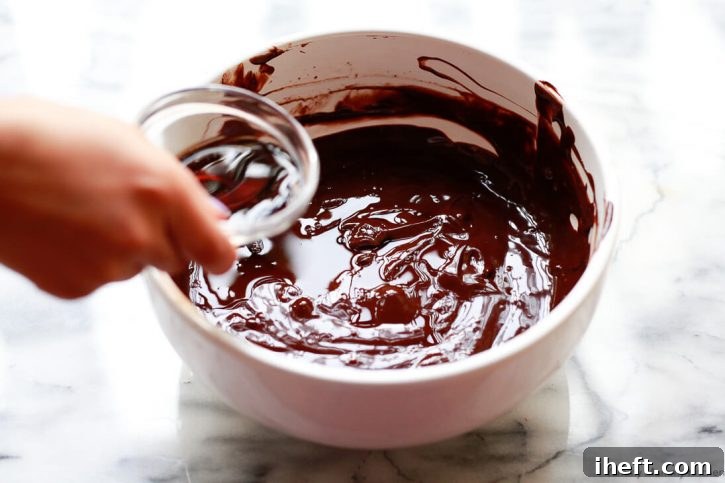 Vanilla extract is added to the chocolate ganache in this vegan chocolate truffle recipe. 
