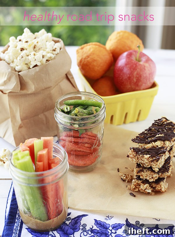 Delicious and healthy snack spread for a family road trip, featuring fresh fruits, veggies, and homemade treats.