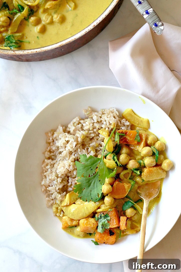 Yellow chickpea curry with butternut squash and spinach is a delicious and healthy vegan main course. 