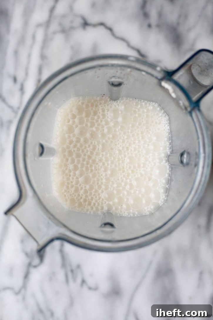 Frothy vegan eggnog after blending in a Vitamix blender. 