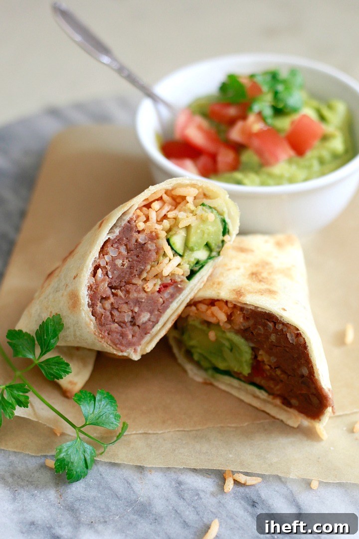 A bean and rice burrito served with guacamole is a great option for vegan meal prep. 