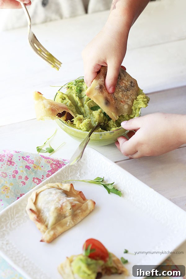 Baked empanadas arranged on a serving plate