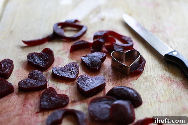 Close-up of freshly roasted beets, sliced into rounds and ready for assembly.