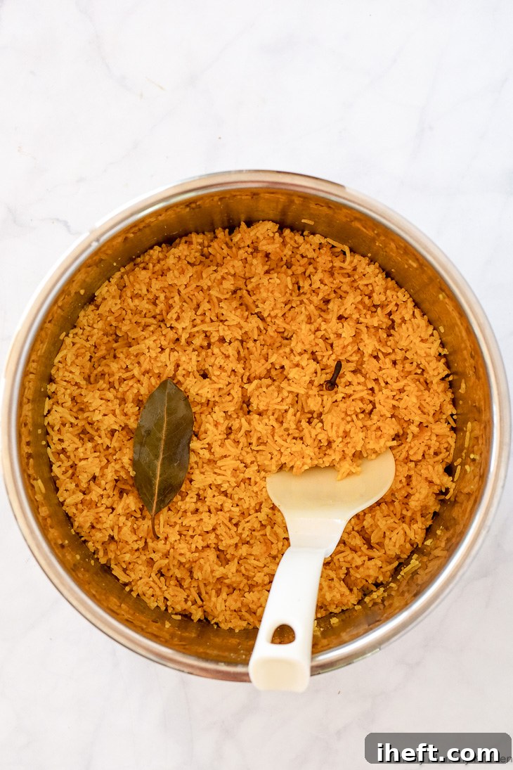 Cooked golden spiced turmeric rice recipe made in an Instant Pot or rice cooker. 
