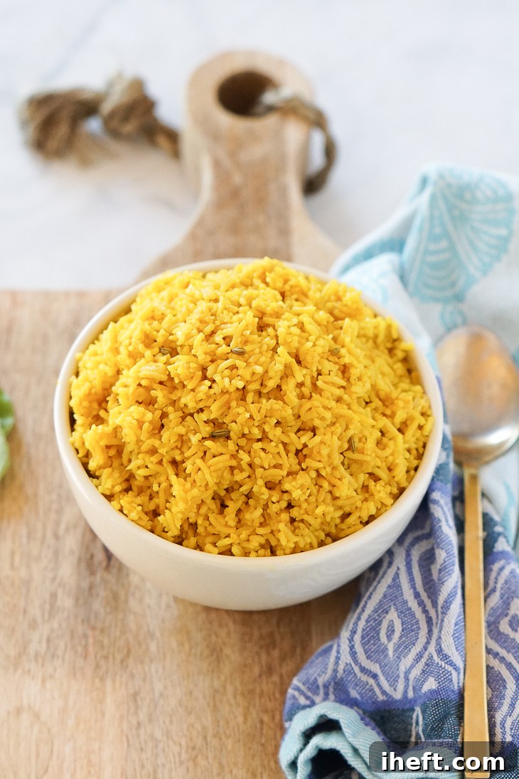 Beautifully golden turmeric rice with Indian spices. This easy turmeric rice is made in the Instant Pot or rice cooker and is vegan and gluten free. It's the perfect side for Indian curries or any main dish!