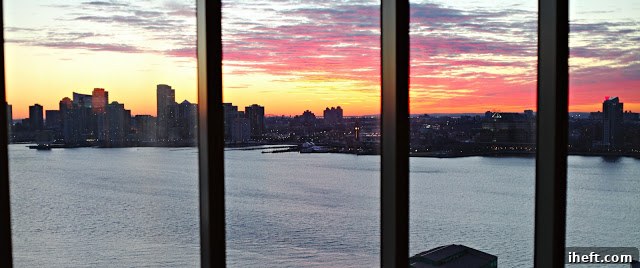 Spectacular sunset over the New York City skyline from a high vantage point