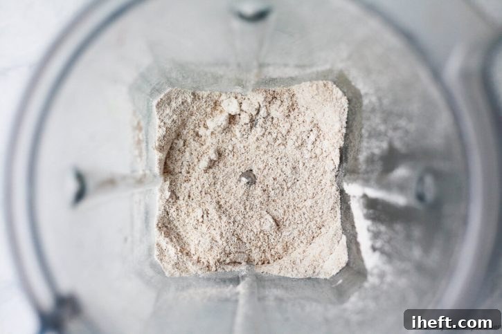 Homemade oat flour in the bottom of a Vitamix blender. Oat flour is great for gluten free baking. 