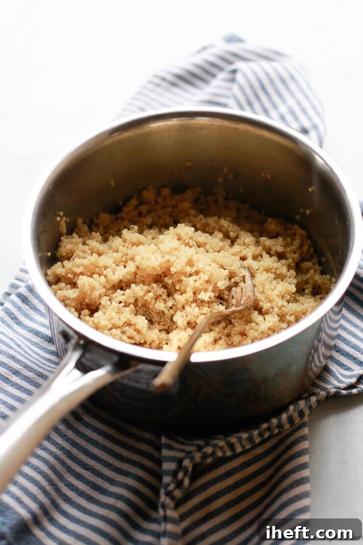 A saucepan filled with perfect fluffy quinoa. 