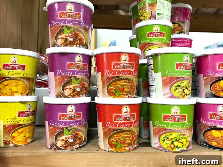 Assortment of Thai curry paste varieties suitable for making yellow curry at home.
