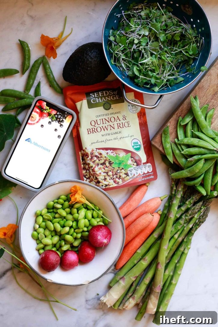 Various fresh ingredients for building wholesome Quinoa and Brown Rice grain bowls with roasted spring vegetables, neatly arranged on a sleek marble countertop, showcasing vibrant colors and textures.