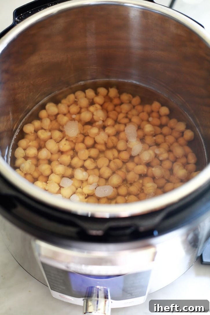 Freshly cooked chickpeas in an Instant Pot pressure cooker are ready to eat. 
