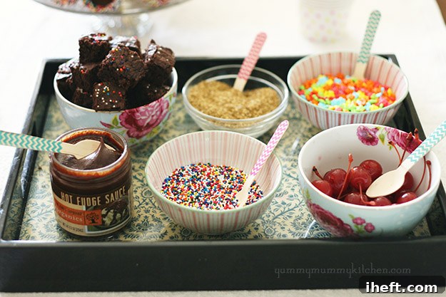 Chocolate-dipped ice cream cones with rainbow sprinkles.