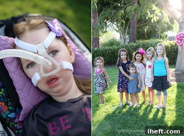 Group of smiling children at a birthday party, including the birthday girl.