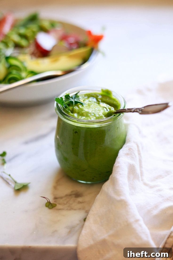 Fresh and vibrant Green Goddess Dressing made with avocado and herbs.