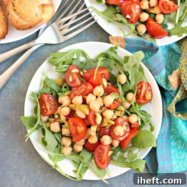 Mediterranean Green Olive Salad Dressing with fresh herbs and olives.