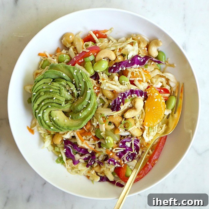 Asian salad with vibrant vegetables and a rich Ginger Sesame Dressing.